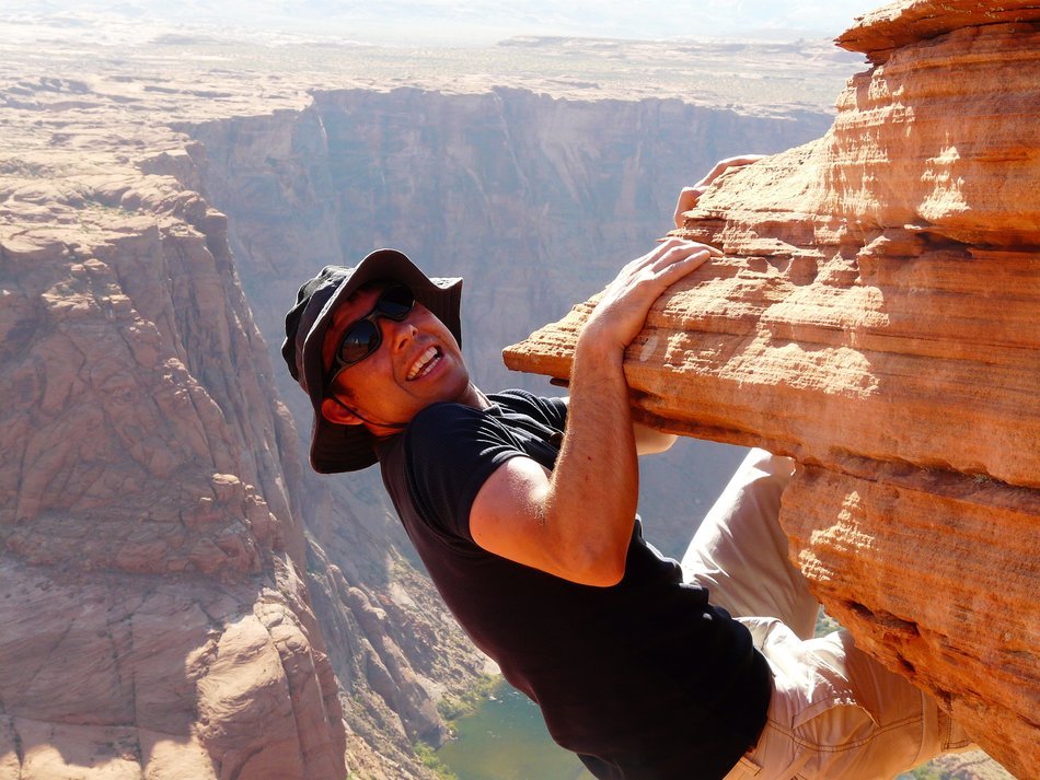 climber on a cliff in Horseshoe Bend, arizona