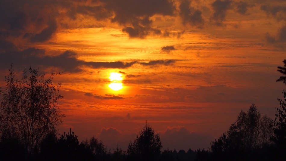 sunset over the horizon in finland