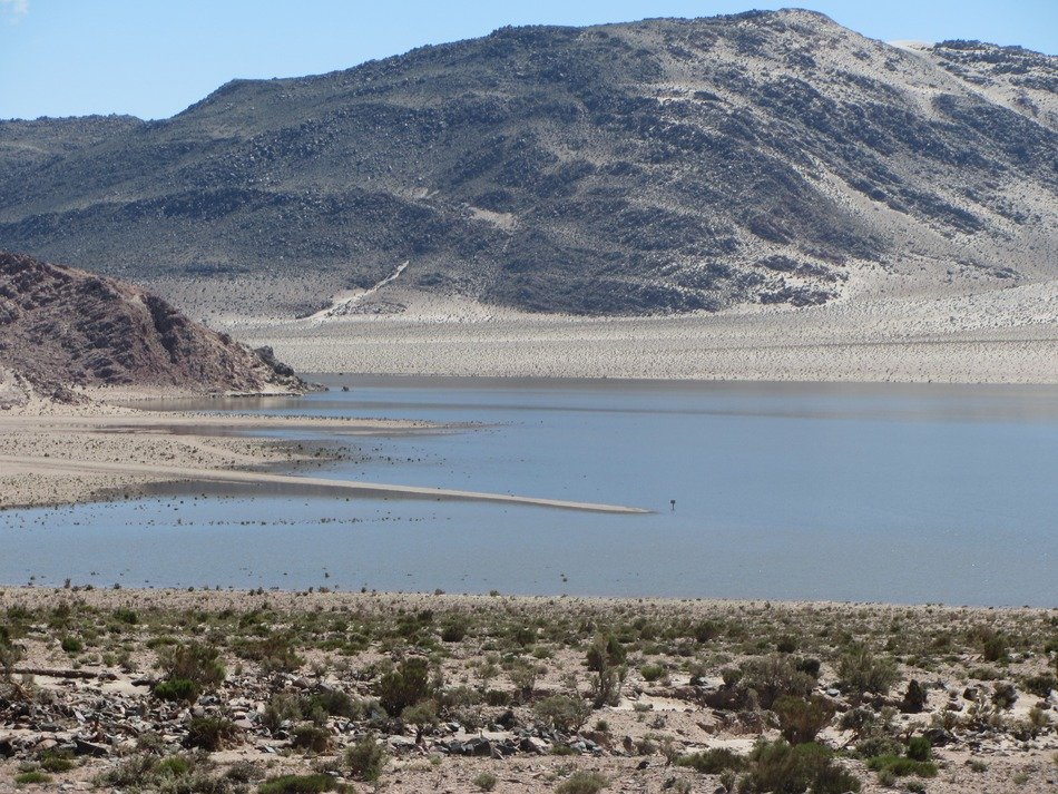 Lake near the hills on landscape in Peru