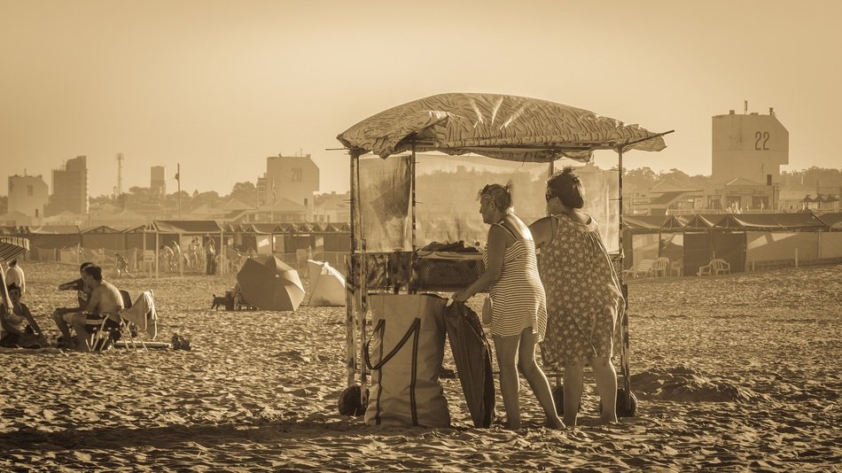 ladies selling on beach monochrome