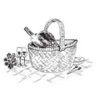 Picnic basket with wine and glasses