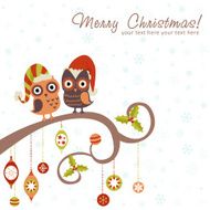 Christmas card of owls in hats sitting N5