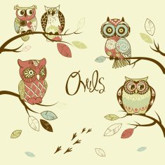 owls sitting on the branches