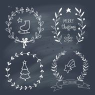 Christmas wreaths set with symbols on chalkboard