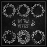 Set of decorative wreaths drawn in chalk on a blackboard N2