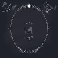 Hand drawn wedding wreath on chalkboard