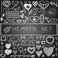 Hand drawn set of hearts and arrows with chalkboard effect