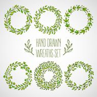 Set of hands drawn decorative wreaths Vector illustration