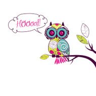 owl sitting on branch