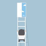 Businessman climbing ladder to the door of freedom