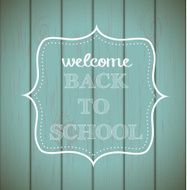 Chalkboard sign &quot;back to school&quot; on wood