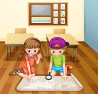 Children reading map classroom
