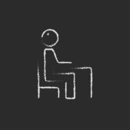 Student sitting on a chair in front of the desk N2