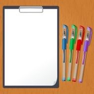 Tablet and pens on the table