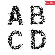 decorative letters A B C D made from ink blots