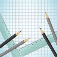 Pencils and rulers on checked paper