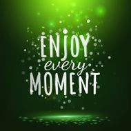 Enjoy every moment drawing lettering at green backdrop