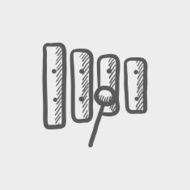 Xylophone with mallet sketch icon