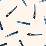 stationary utility knife cartoon seamless pattern background