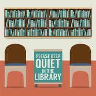 Reading Seats In Front Of A Bookcase With Forbidden Poster