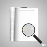 Open paper magazine with magnifying
