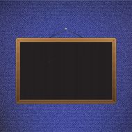 Vector Black chalkboard with brown corners over jeans