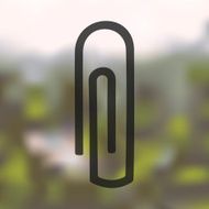 paper clip icon on blurred background