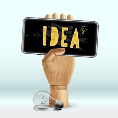 Idea concept Wooden human hand with mobile phone