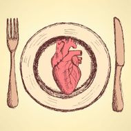 Sketch human heart on the plate in vintage style