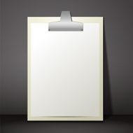 Blank white paper sheet in a clipboard of standing on