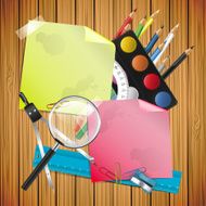 School composition on wooden background