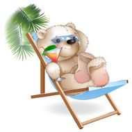 Bear lying sun loungers by the sea