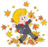 Schoolboy with autumn leaves