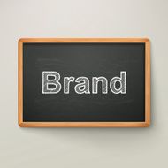 brand on blackboard in wooden frame