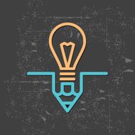 bulb and pencil on grunge background