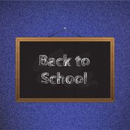 Black chalkboard over jeans back to school