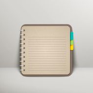open blank lined notebook over grey