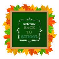 Chalkboard sign &quot;back to school&quot; with leaves