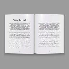 Open paper book with text