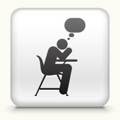 White Square Button with Thinking on School Desk