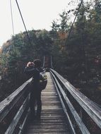 photographer on the wooden bridge