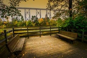 wooden benches for relaxing near the river