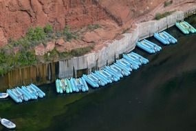 panoramic view of blue rubber boats on the colorado river