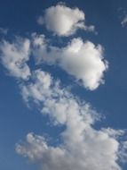 blue sky with white clouds various forms