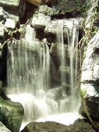 waterfall stream in rocks black and white scene