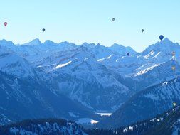 hot air balloon in the mountains