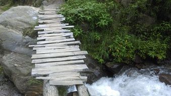 Wooden bridge on the rocks