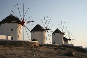 windmills on a hill in Greece