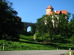 historic castle on a green hill