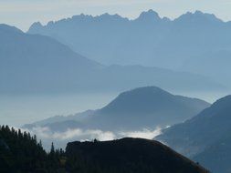 blue mountains and water in the mist